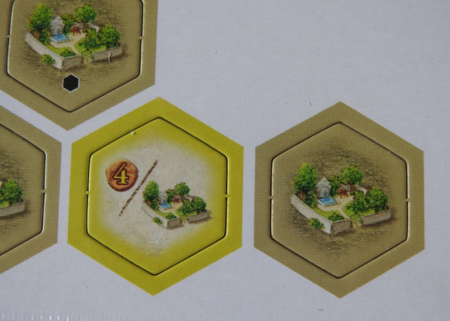 Close-up of one of the knowledge hexes and one of the Pleasure Garden hexes.