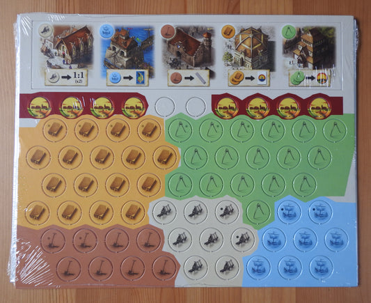 Top view of the Catan Frenemies mini expansion, showing all the tiles and chips that are included.