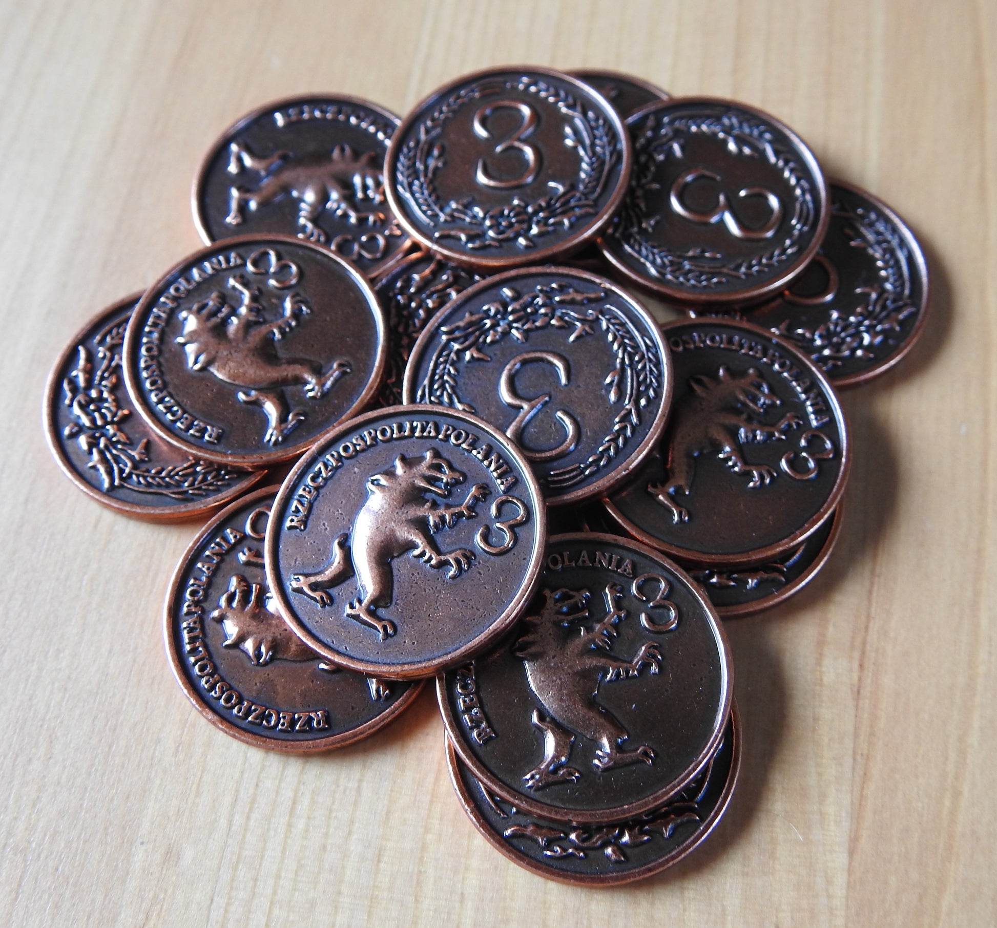 Close-up view of the bronze $3 coins.