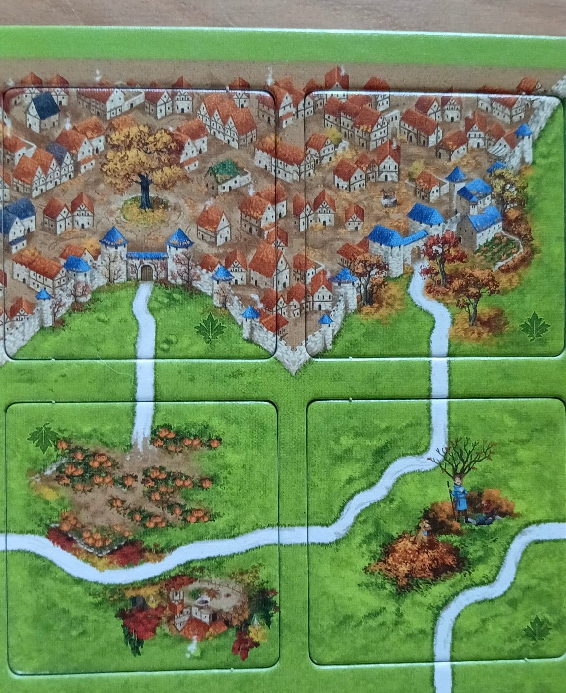 A look at 4 more tiles, with autumnal trees amongst the city walls in this Autumn mini expansion for the Carcassonne board game.