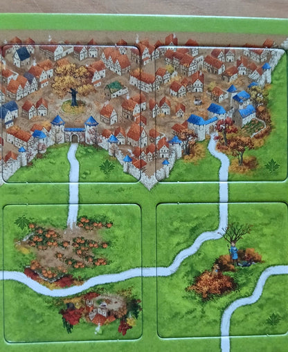 A look at 4 more tiles, with autumnal trees amongst the city walls in this Autumn mini expansion for the Carcassonne board game.