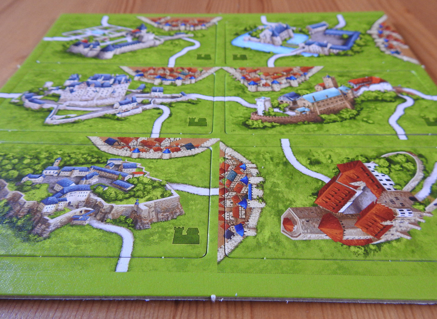 A lower view of all 6 of the double sized tiles included in this German Castles mini expansion for Carcassonne.