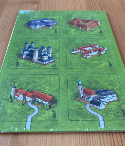 Closer view of the 6 tiles included in this Carcassonne German Monasteries mini expansion.