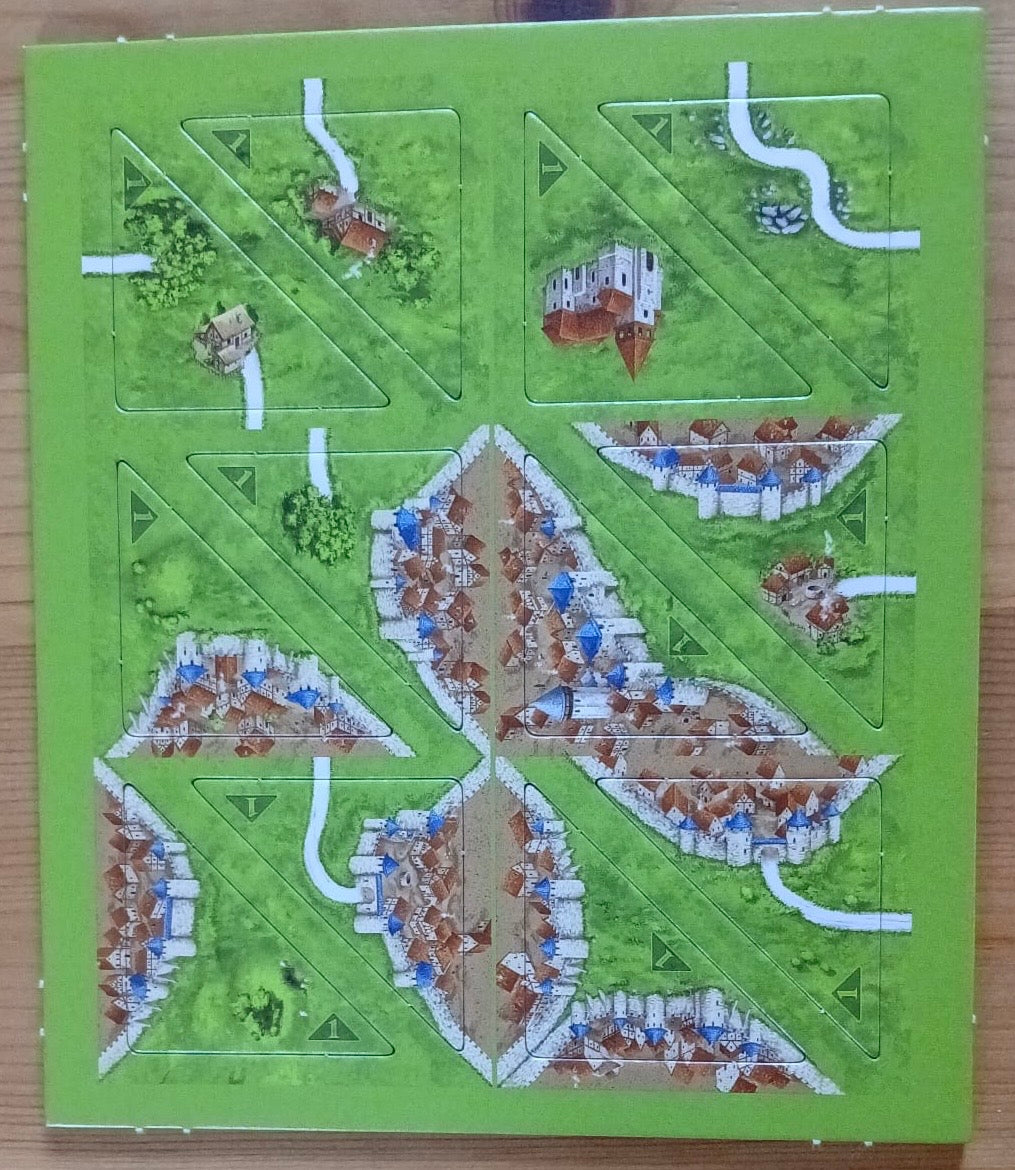 View of the other 12 half-sized tiles that make up this Halflings 1 & 2 mini expansion for the Carcassonne board game.