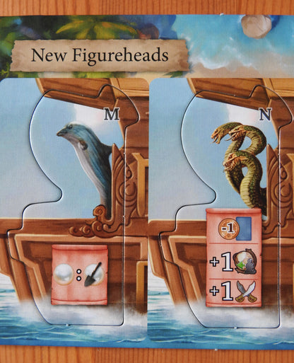 Closer view of both of the new figureheads included in this minii expansion for Pirates of Maracaibo.