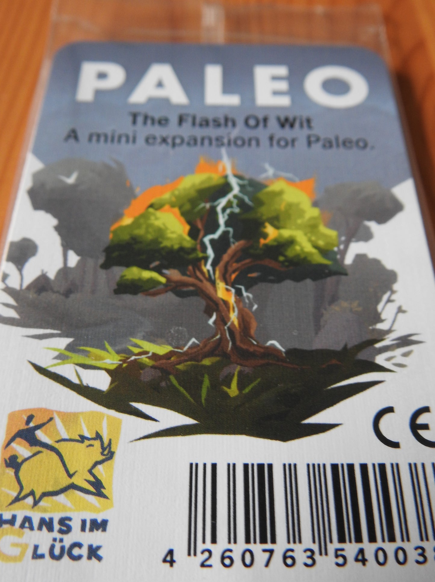 Closer look at the font card, showing thunder splitting a tree for this Paleo Flash of Wit mini expansion.