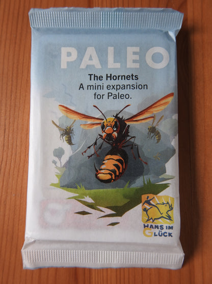 View of the packet of seal cards that forms this Paleo Hornets mini expansion.