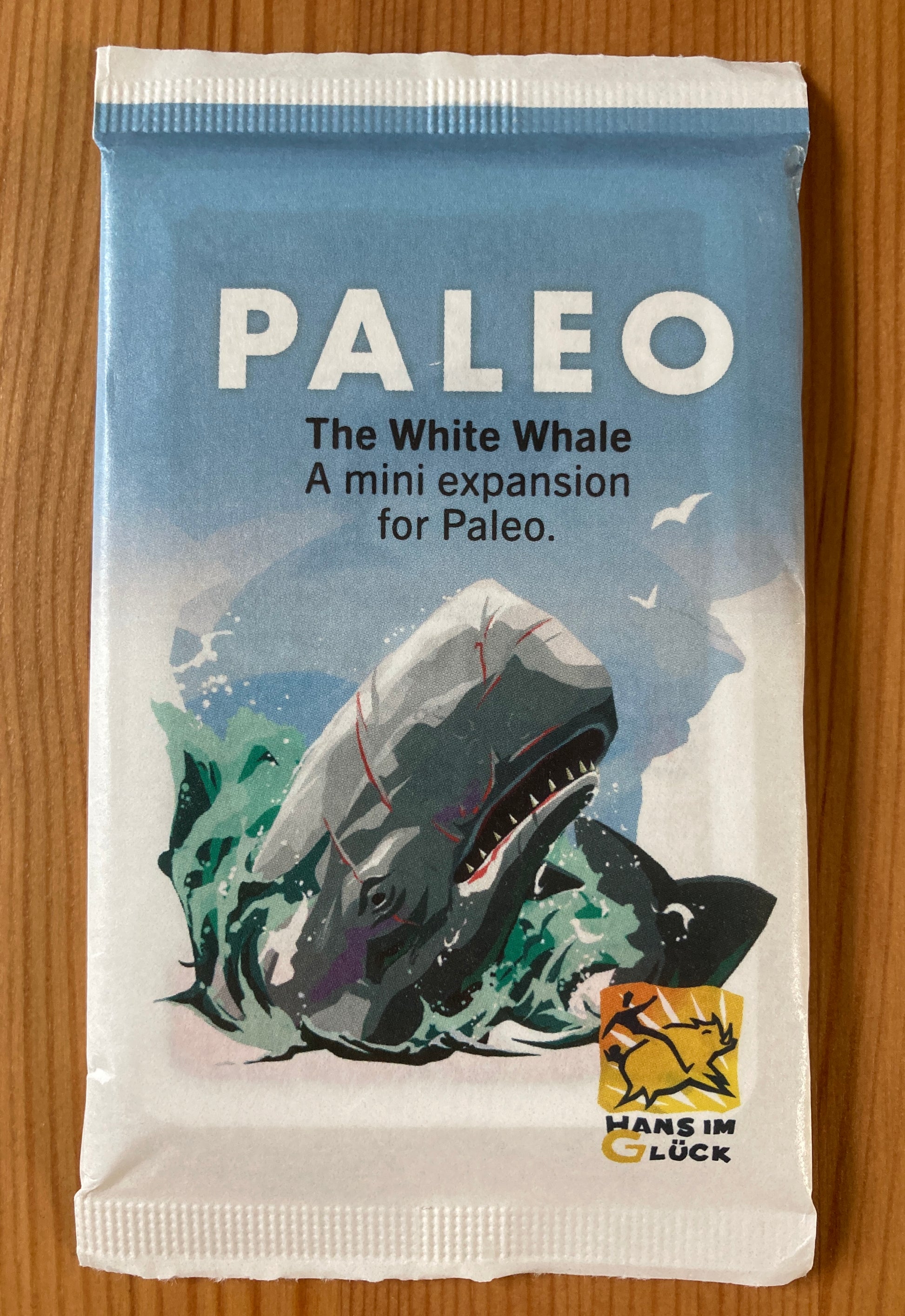 View of the front of the deck of cards that makes up this Paleo White Whale mini expansion.