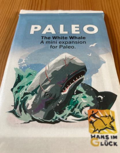 Closer view of the front of the pack, showing a large whale emerging from the water as part of this Paleo White Whale mini expansion.