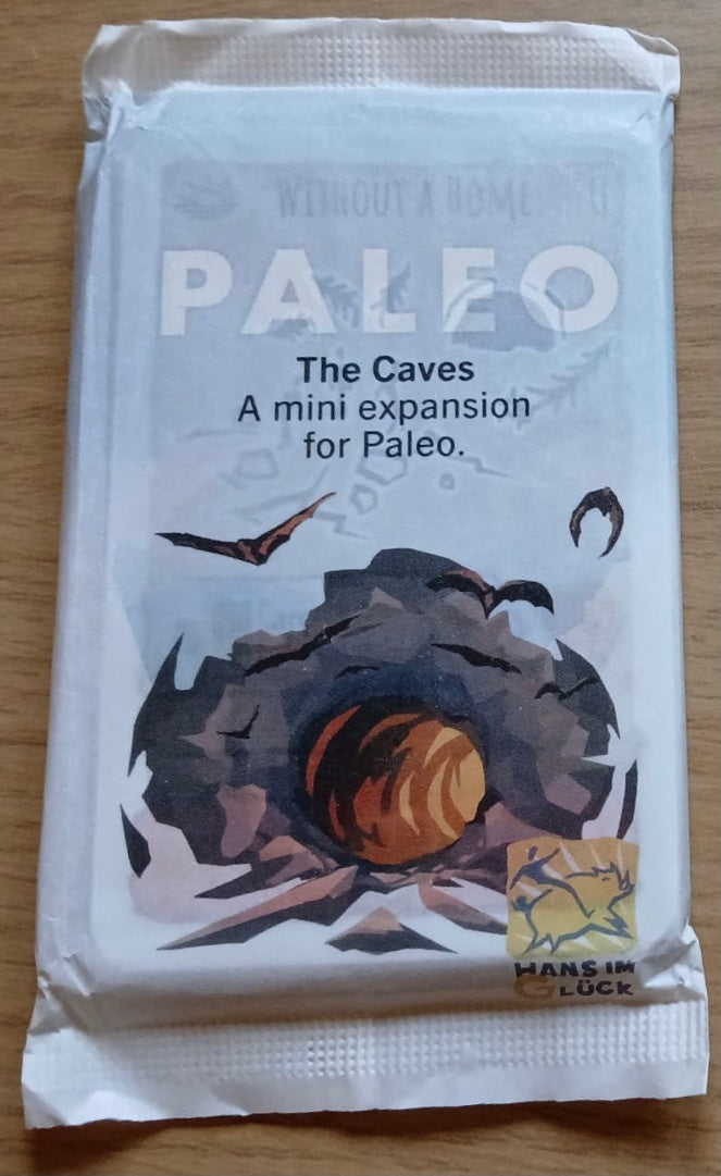 View of the front of the pack for the Caves mini expansion for the Paleo board game.