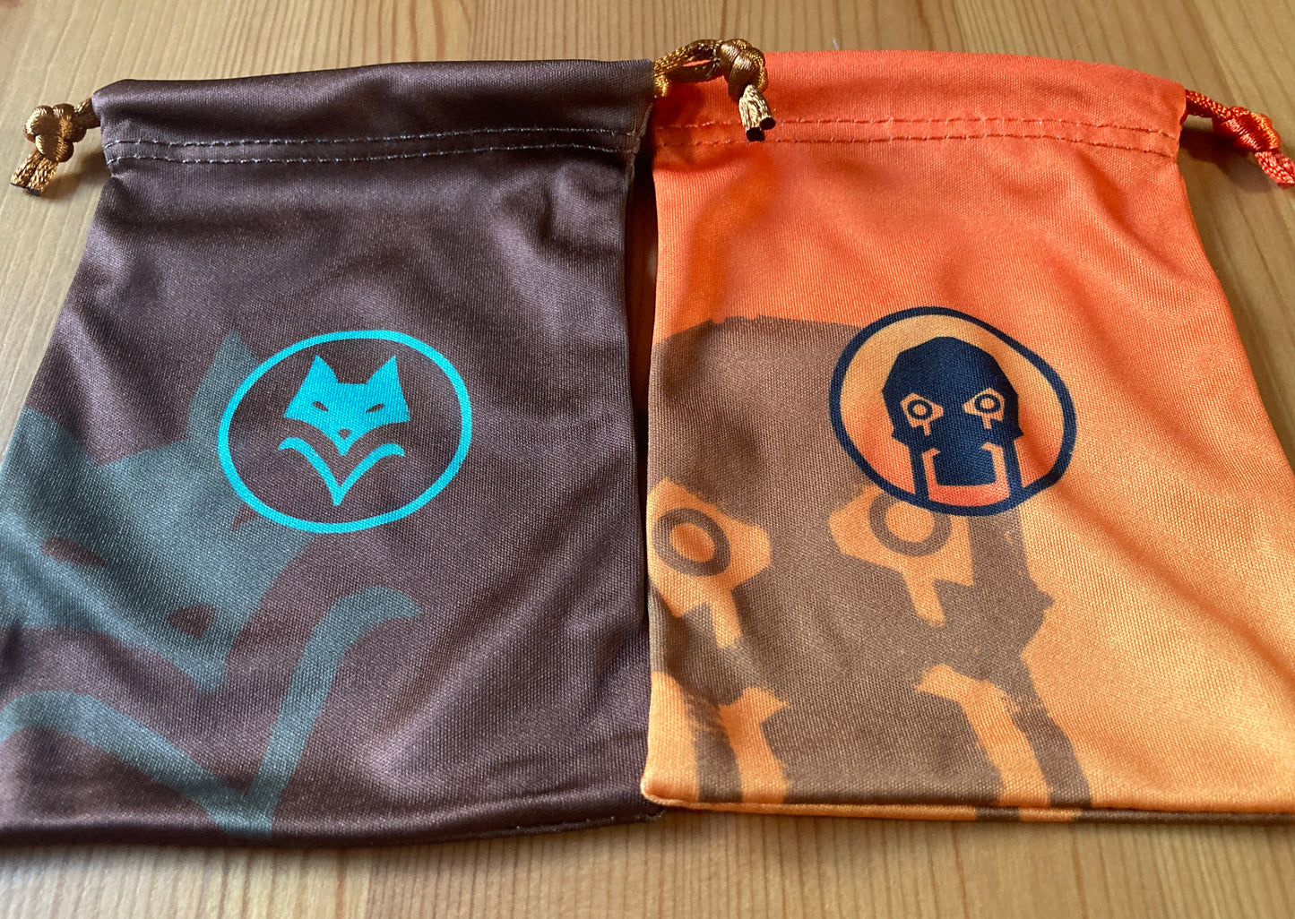 Closer angle view of both of the bags included with this Scythe 2 Rise of Fenris Expansion Bags accessory.