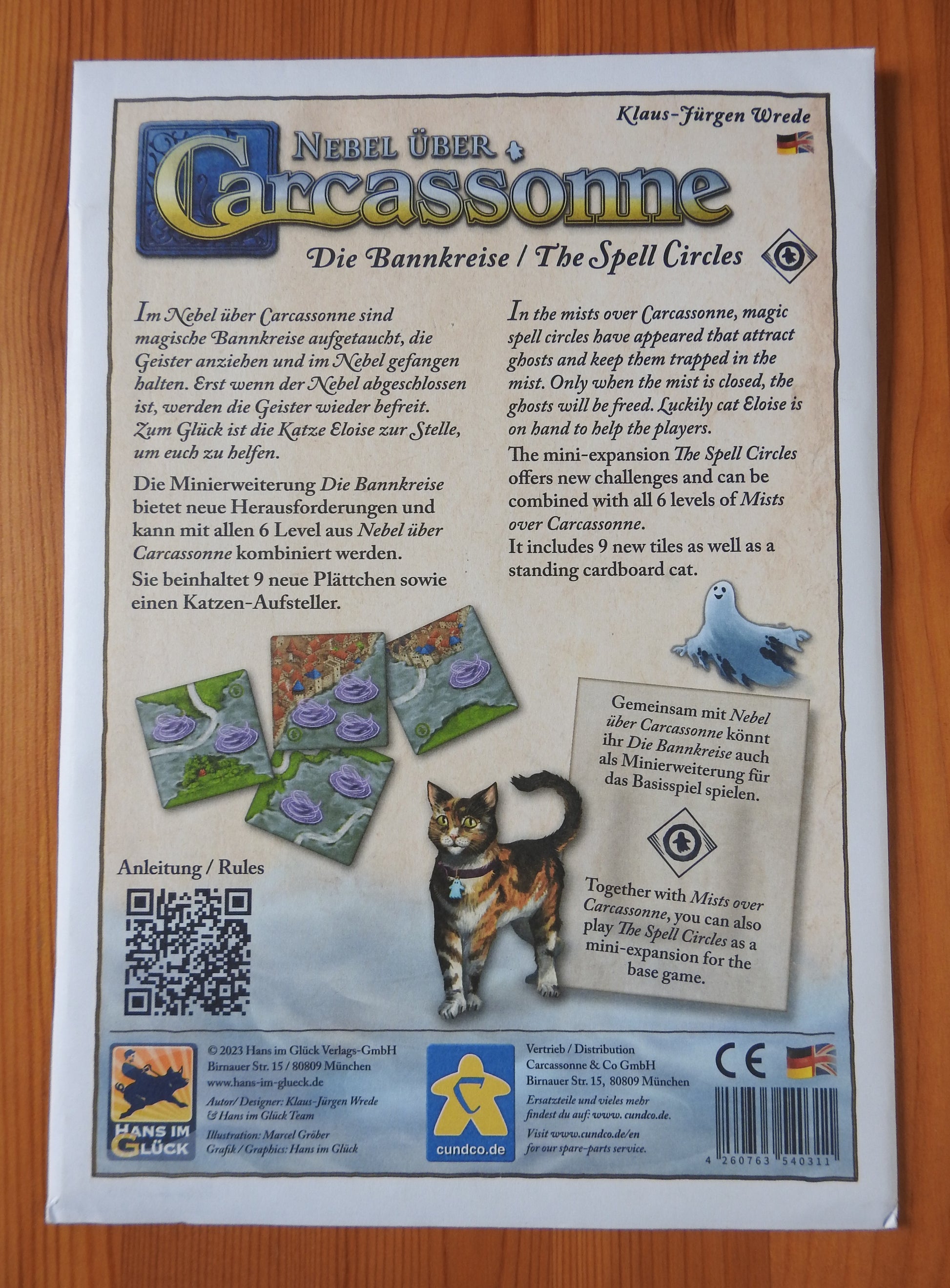 View of the envelope that the Spell Circles mini expansion comes in, that includes introductory text in both England and German.