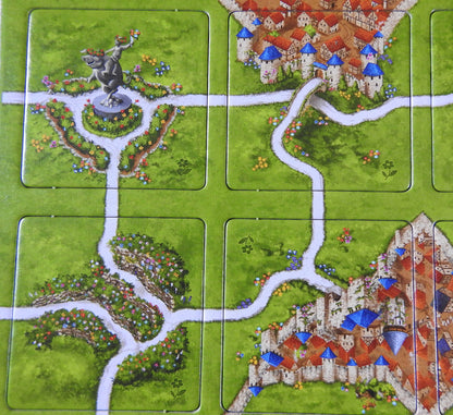 Close-up view of the beautiful statue tile and others included in this Spring mini expansion for Carcassonne.