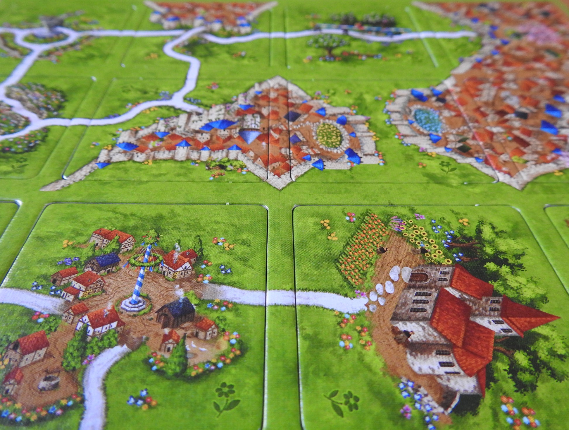 View of more tiles featuring beautiful illustrations in this Spring mini expansion for Carcassonne.