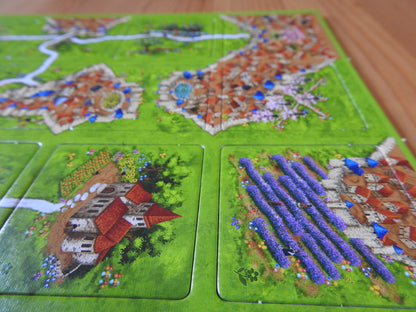 Another view of the included tiles, including a field of lavendar in this Spring mini expansion for Carcassonne.