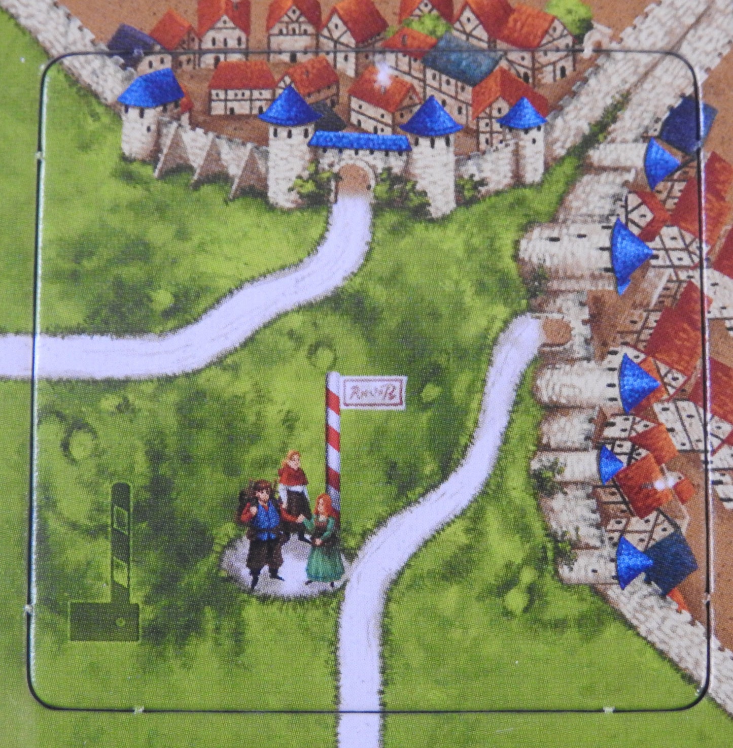Close-up of one of the tollkeeper tiles, showing three figures walking on the road!