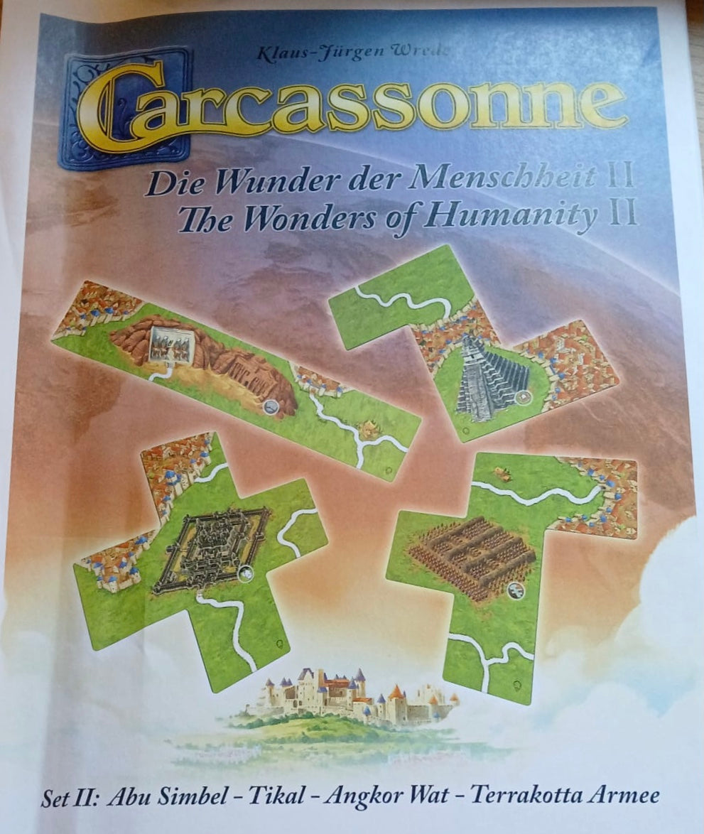 View of the envelope containing all the tiles for this Wonders of Humanity II mini expansion for the Carcassonne board game.