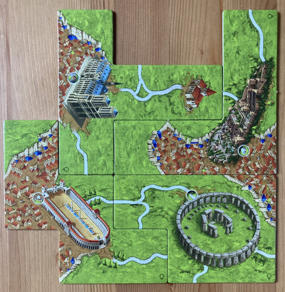 View showing the 4 large tiles included in this Carcassonne Wonders of Humanity I mini expansion.