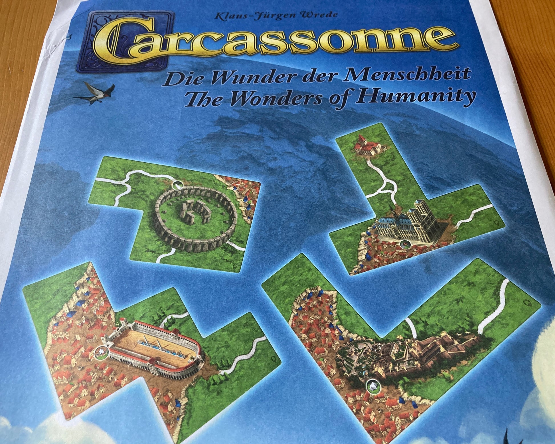 View of the envelope packaging this Wonders of Humanity mini expansion for Carcassonne comes in.