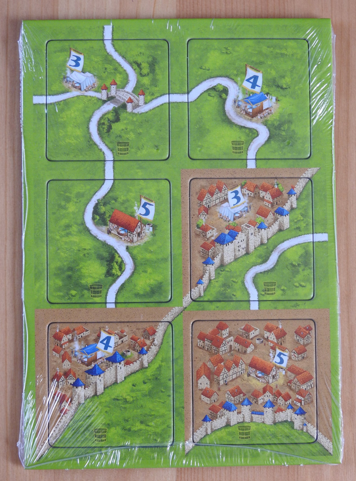 View of the six Carcassonne tiles that come with the Barber Surgeons mini expansion.
