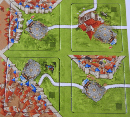 Close up view of 4 of the included tiles in this Carcassonne Bets mini expansion.