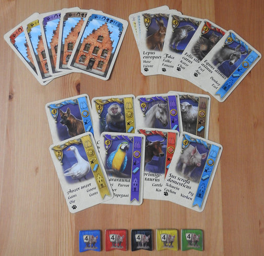 Top view of the Bruges Pets mini expansion, showing all the cards and tokens.