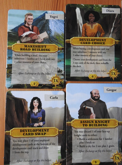 Close-up view of 4 of the character tiles that come with this Catan Scenarios Helpers mini expansion.