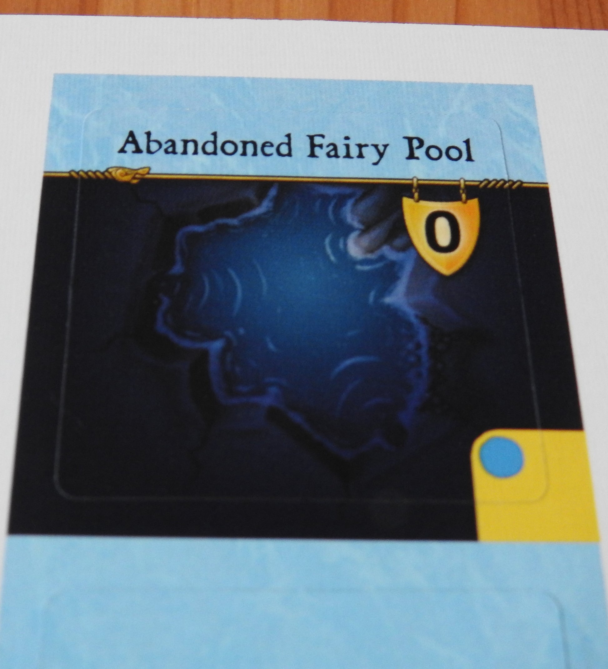 Close-up of the reverse of the Fairy Pool tile, which is labelled 'Abandoned Fairy Pool'.