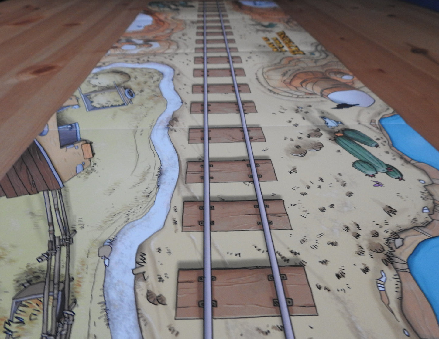 Side view of the play mat, looking down the tracks off into the Wild West!