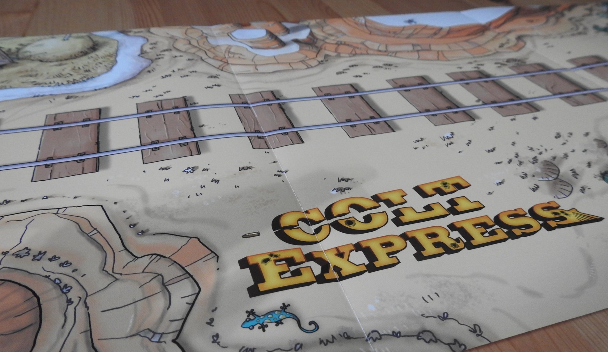 Close-up view of the tracks next to the Colt Express logo.