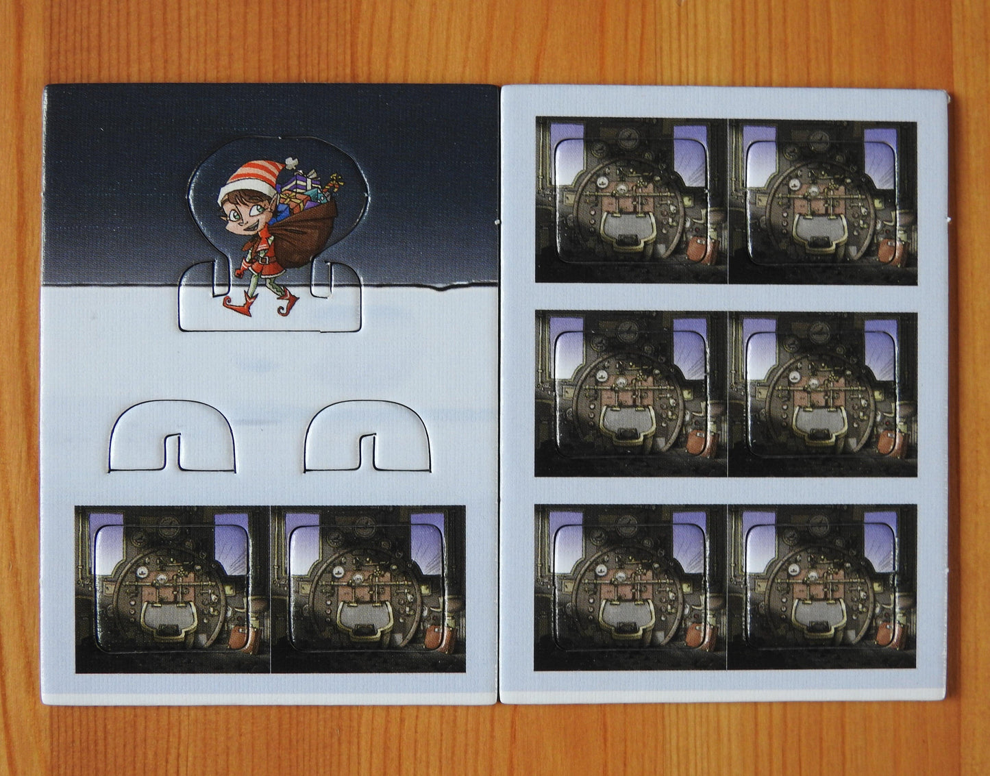 Top view of the Colt Express Santa Claus Elf mini expansion pieces.