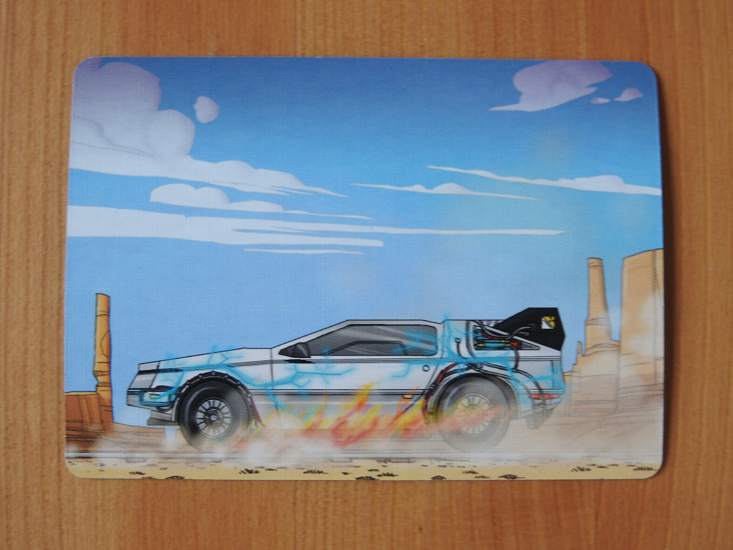 Another view of the card, this time from the obverse, with the car pointing to the left.
