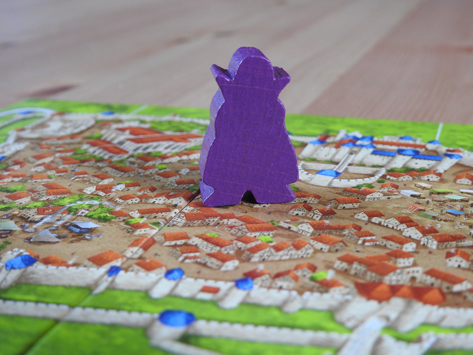 Close-up view of the brooding Count meeple figure as he stalks the streets of the city of Carcassonne. Scary!