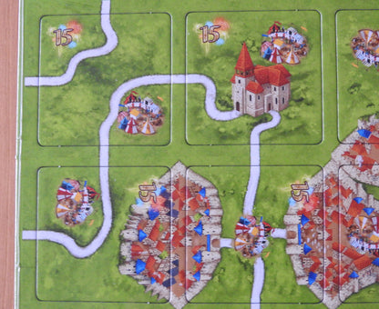 Close-up of 4 of the included tiles in this Carcassonne Festival II mini expansion.