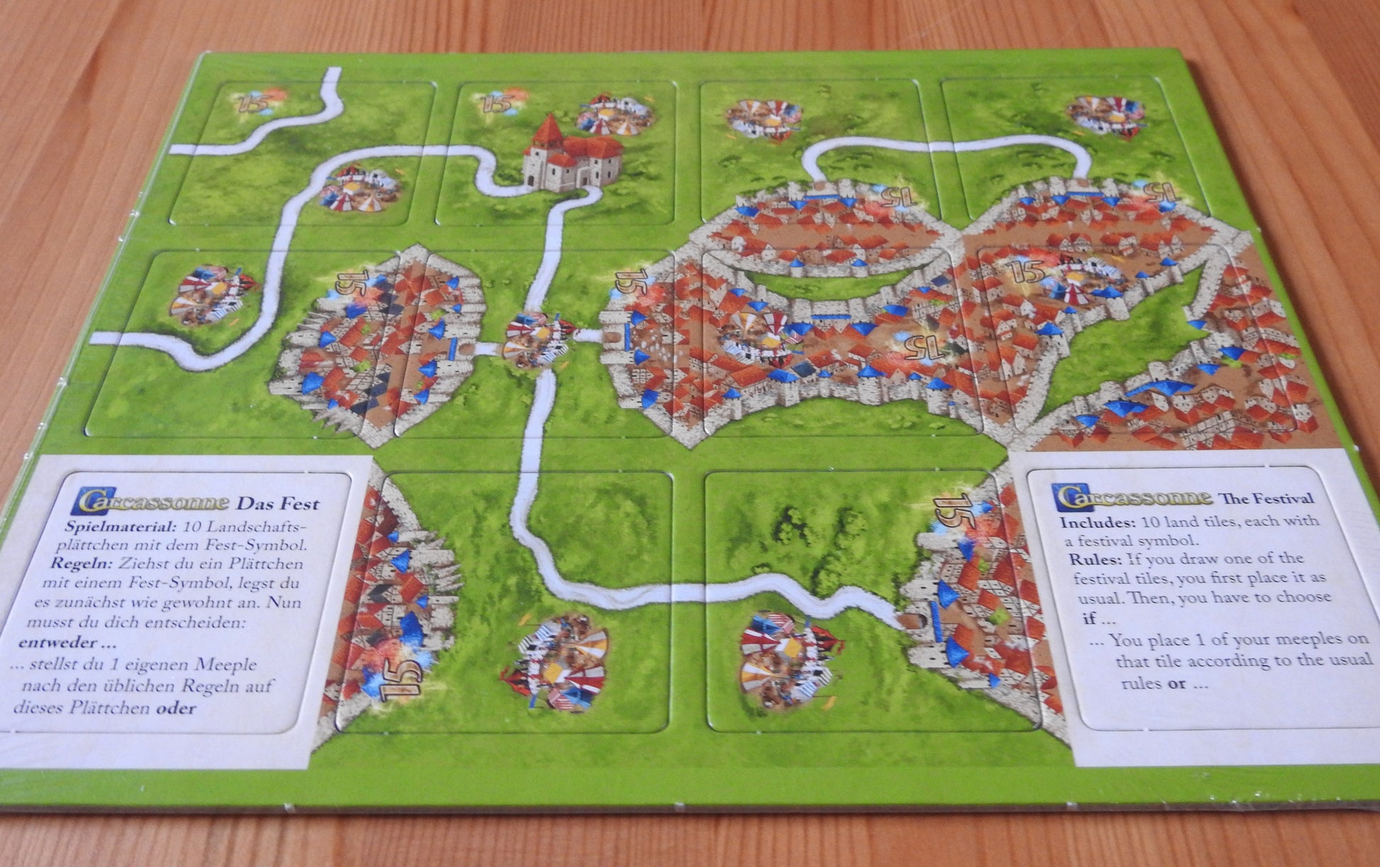 Different angle showing all the included tiles in this Carcassonne Festival II mini expansion.