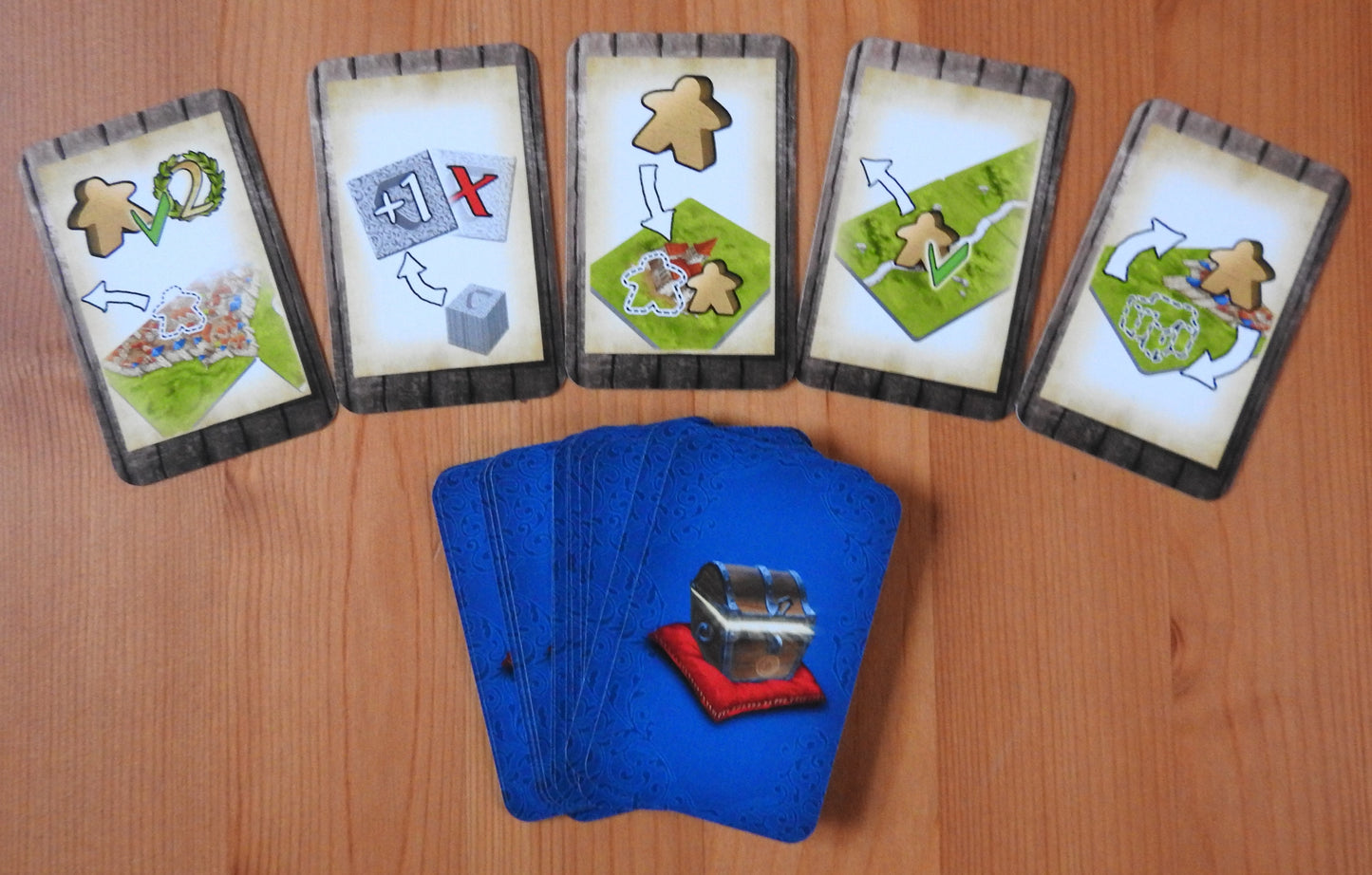 View showing the 5 different card types included in this Carcassonne Gifts mini expansion.