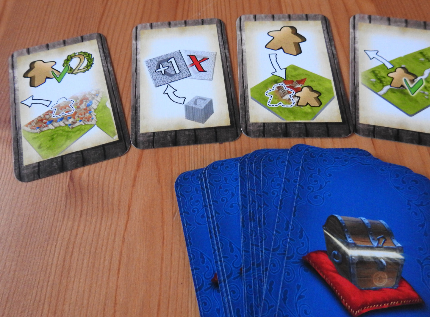 Closer view of some of the different card types in Carcassonne Gifts.