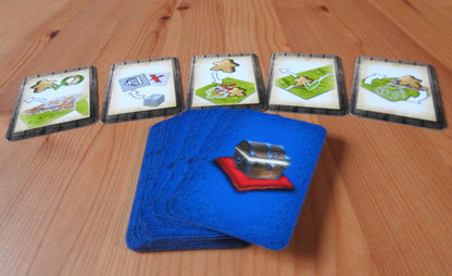 Different angle showing the whole deck of cards for the Carcassonne Gifts mini expansion.