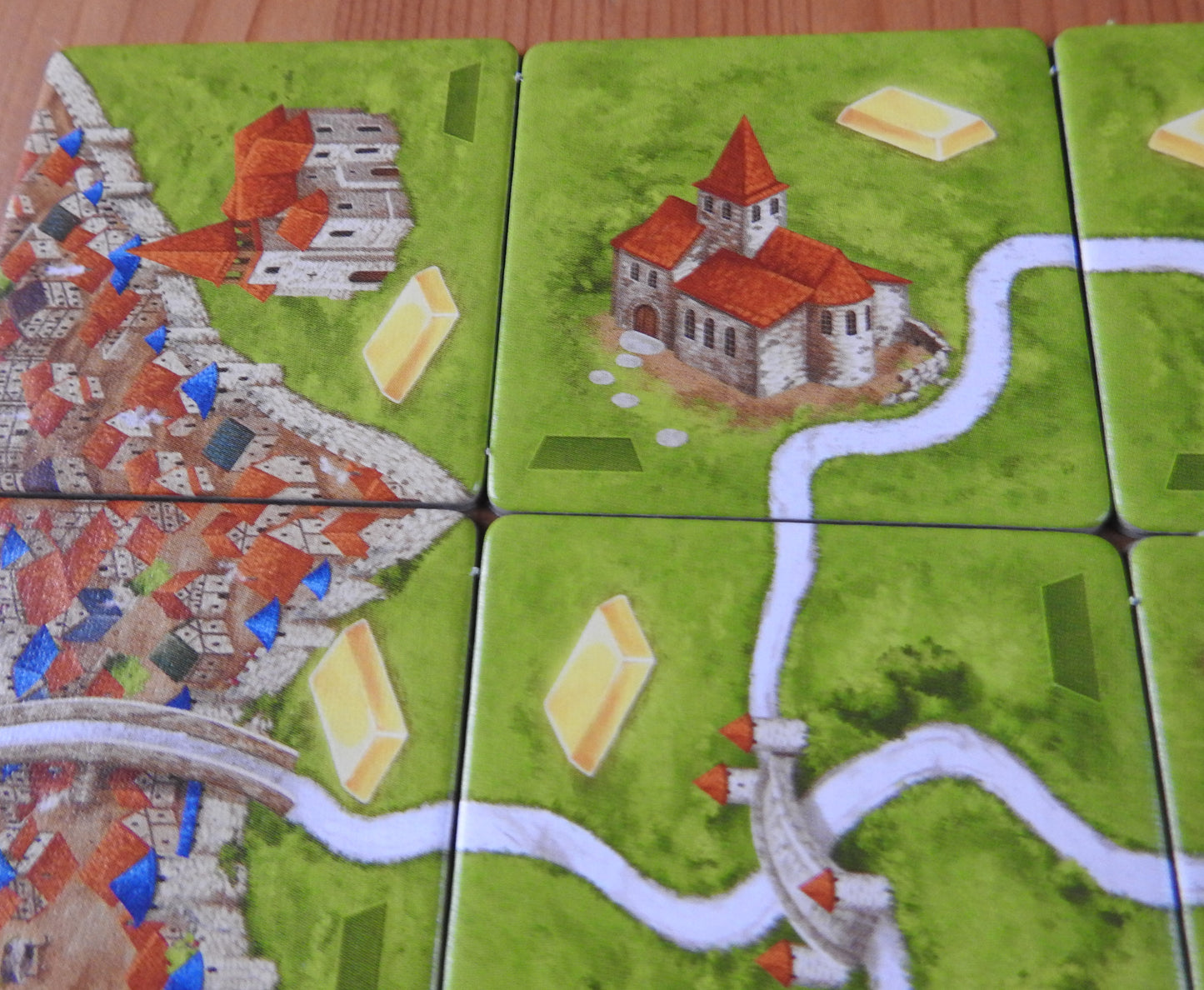 A close-up of some of the tiles for this Carcassonne Gold Mines expansion.