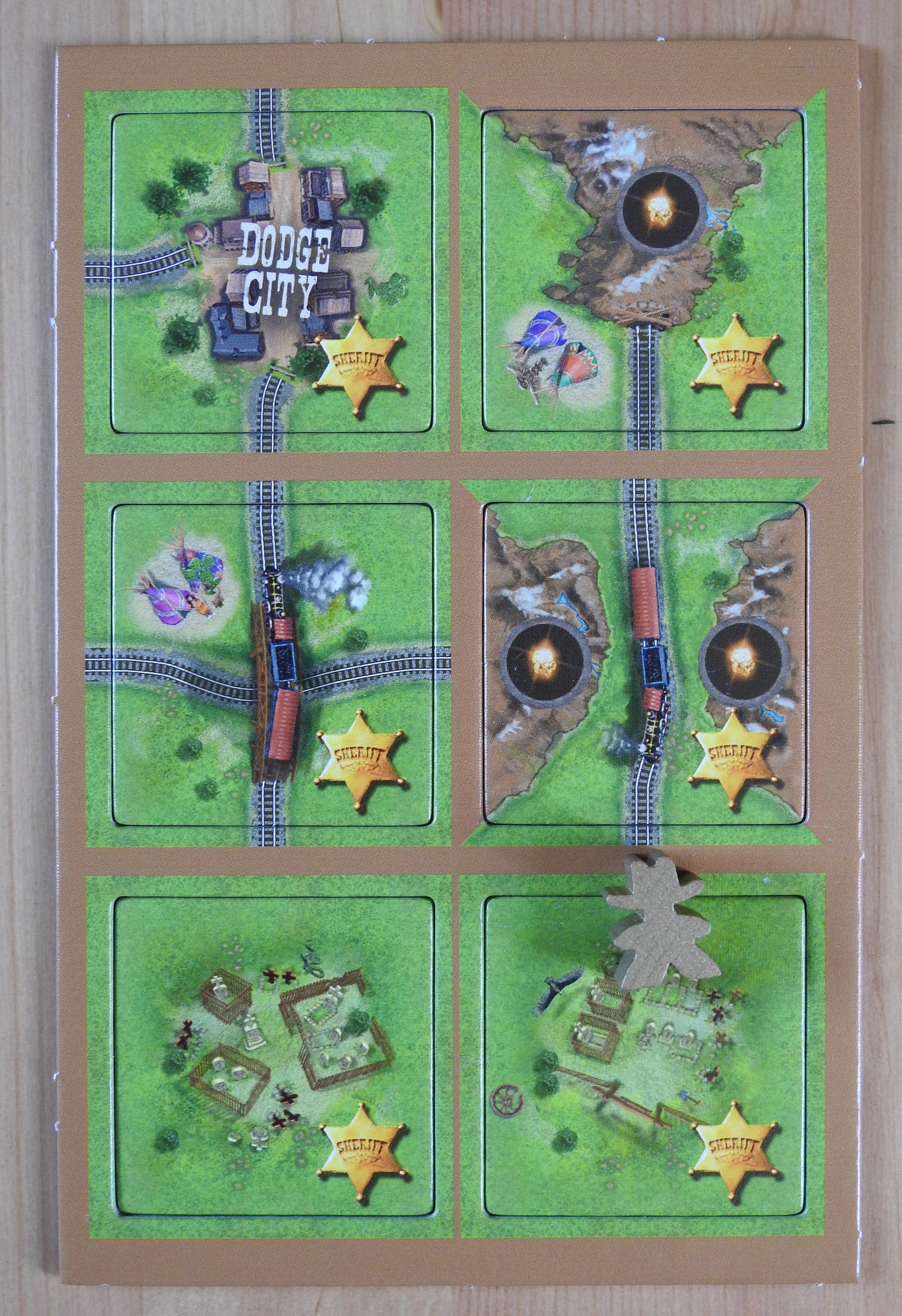 View of the six Carcassonne Gold Rush - Sheriff mini expansion tiles.