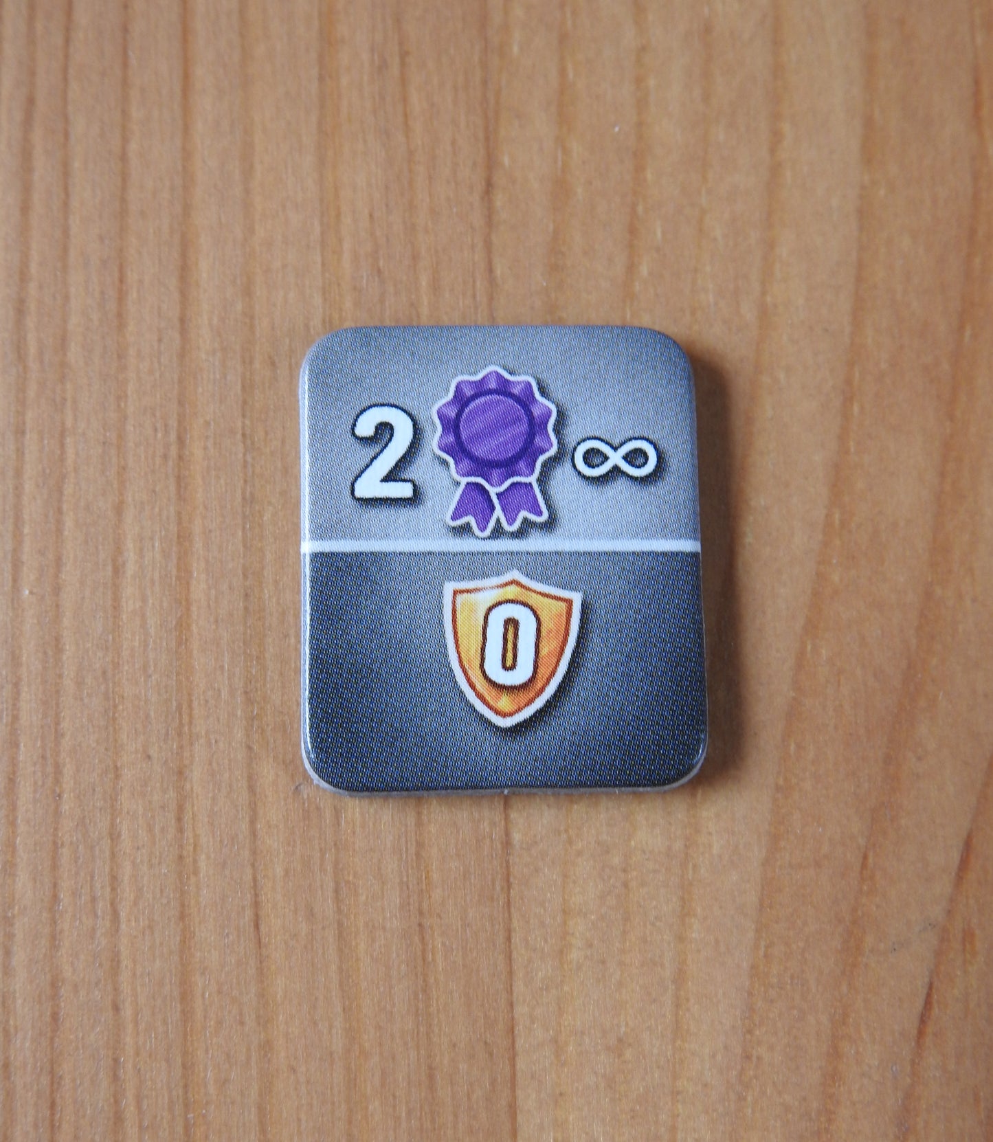 Close-up of 1 of the included tiles, which features a special bonus.