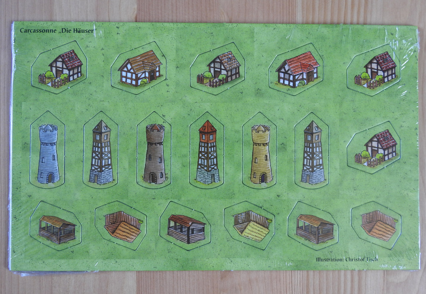 Front view of the 18 buildings included in this Little Buildings Carcassonne Mini Expansion.