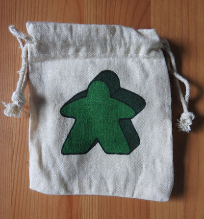Close-up of the green meeple bag.