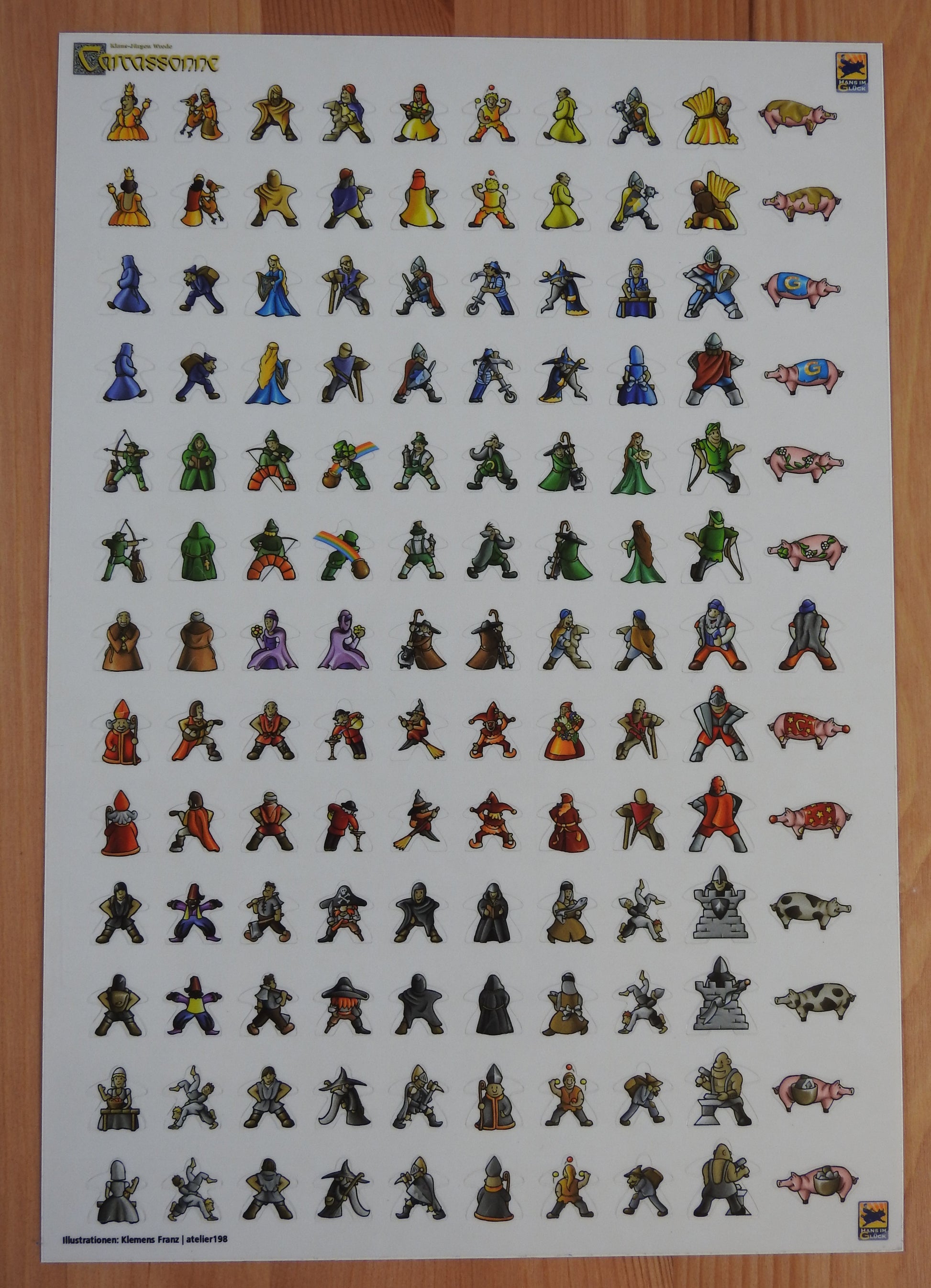 Sticker sheet of 130 meeple stickers to attach to pieces used in the Carcassonne board game.
