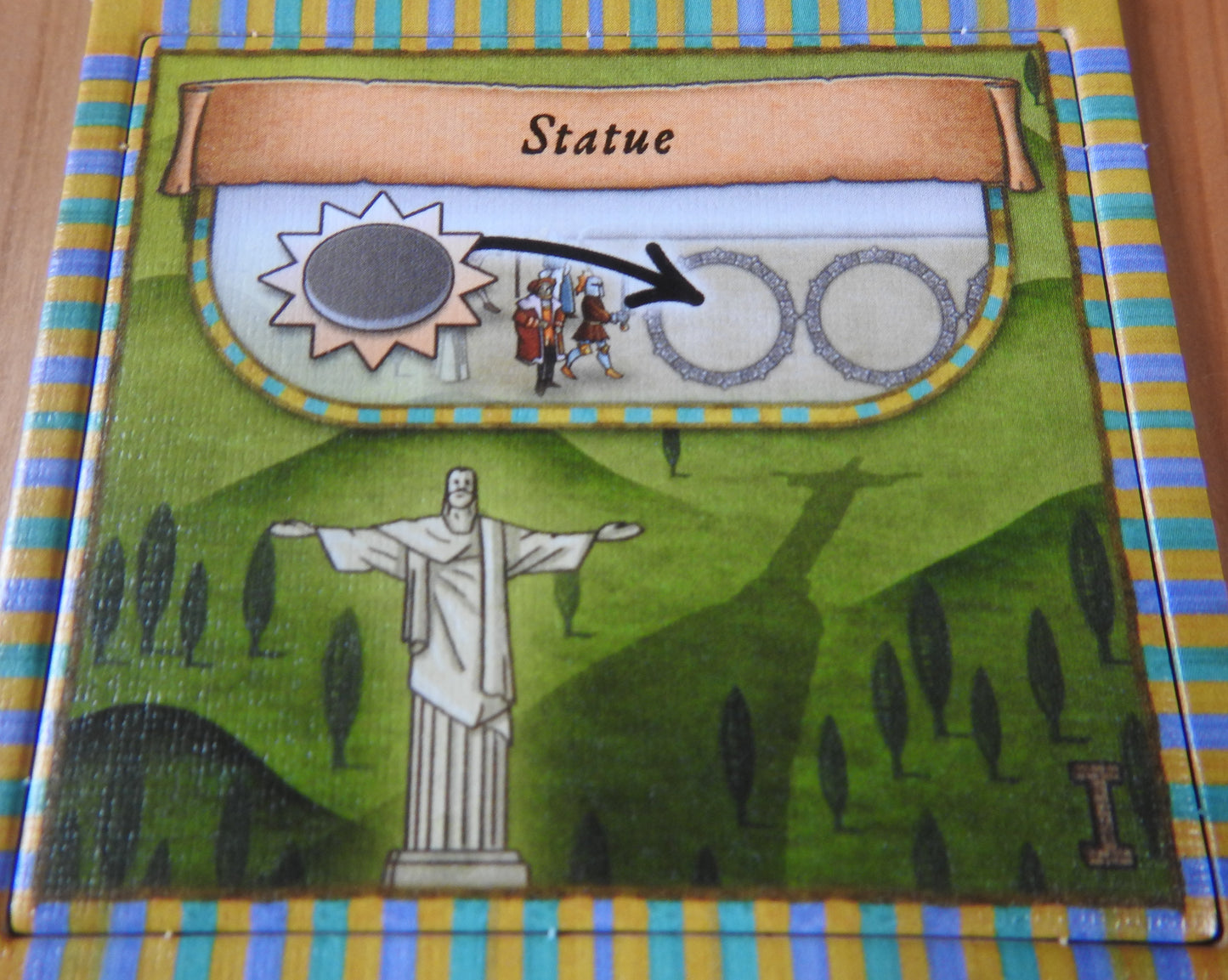 Close-up view of the Statue promo place tile.