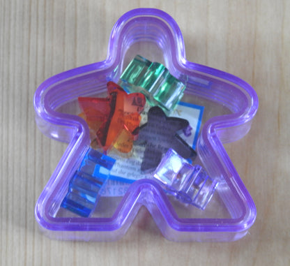 Purple Meeple box with the six mini meeples shown inside!