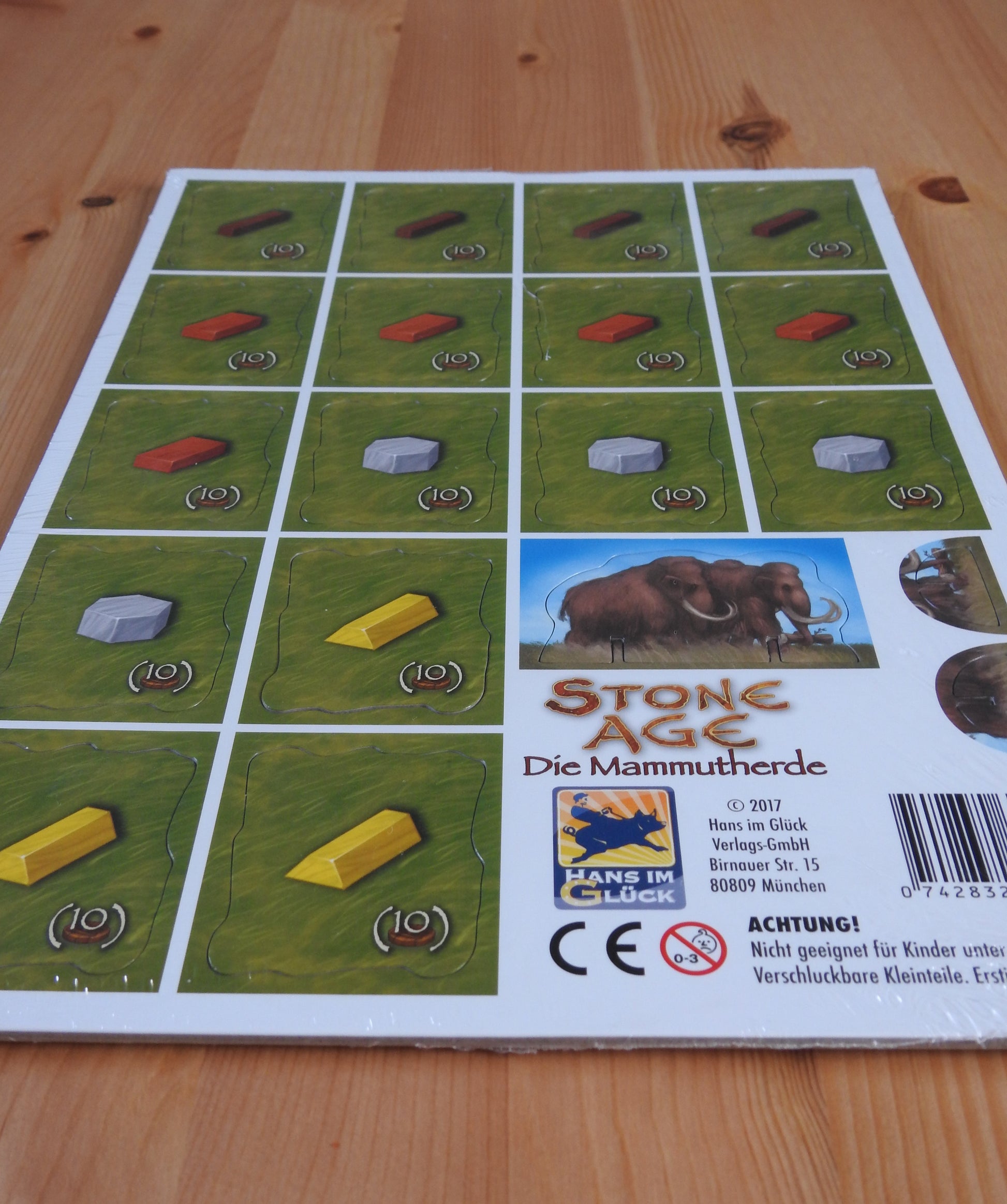 Long view of the tiles and pieces included in this mini expansion.