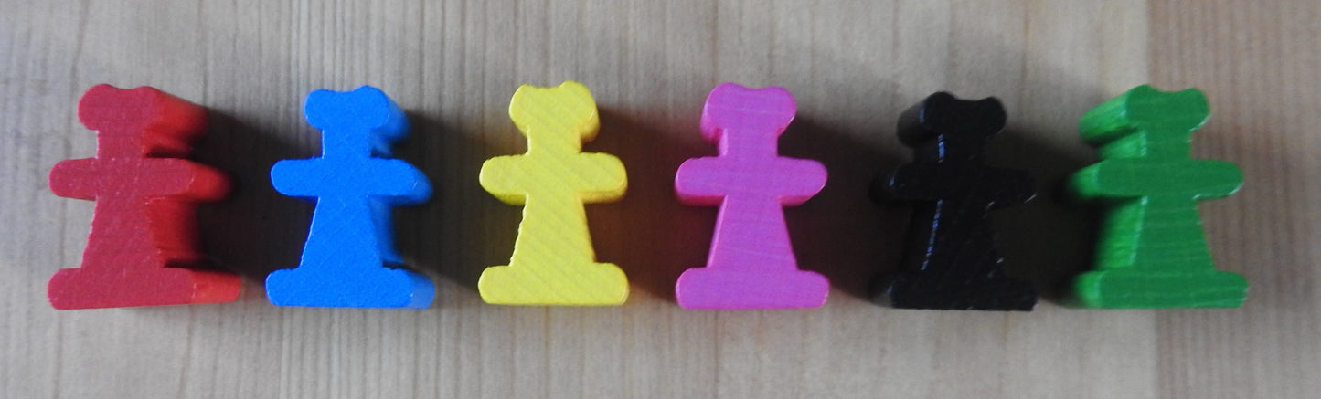 Close-up view of all 6 of the wooden trader meeple figures included in this Carcassonne Traders & Builders Unboxed expansion.