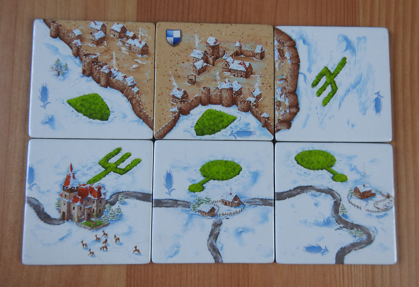 Top view of the 6 Winter tiles that come with the Winter Corn Circles Carcassonne Mini Expansion.