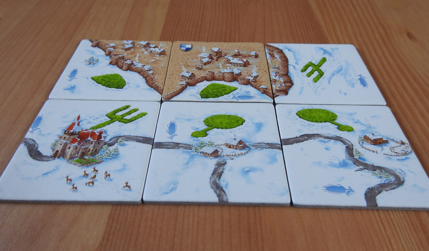 Long view of the 6 winter tiles shown at an angle.